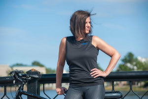 Woman wearing Herron black V-neck moisture wicking performance t-shirt.